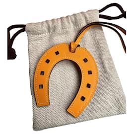 Bijou de sac Hermès Paddock Orange en cuir