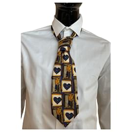 Yves Saint Laurent Seidenkrawatte – Muster 'Herzen & Fackeln', blau/gold – Hergestellt in Italien