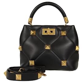 Borsa a mano piccola Valentino nera trapuntata con borchie romane