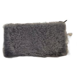 Clutch Balenciaga in pelle e pelliccia grigia