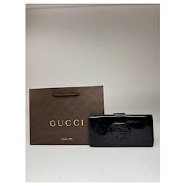 Portafoglio vintage Gucci GG in pelle verniciata nera
