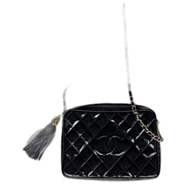 bolso cruzado vintage Chanel logo CC