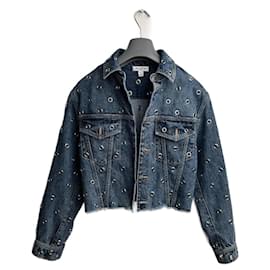 Chaqueta corta de mezclilla azul con ojales Alaïa