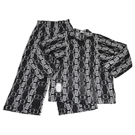 Conjunto de camisa de manga larga y pantalones impresos en negro/blanco de Hermès