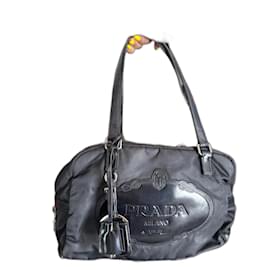 Borsa bowling Prada nera in pelliccia e nylon