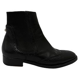 Stivali Chelsea perforati Balenciaga in pelle nera