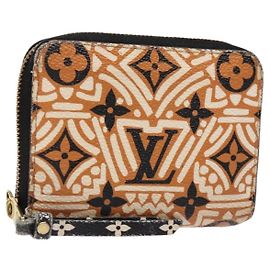 LOUIS VUITTON Monograma Gigante Crafty Monedero Zippy Caramelo M69496 Auth 136331
