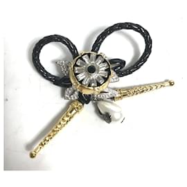 Spilla in pelle nera e metallo con strass Louis Vuitton
