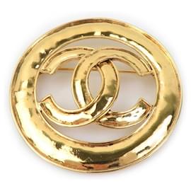 Spilla in metallo dorato Chanel Coco Mark
