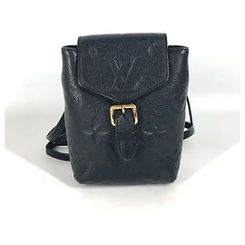 Zaino Tiny Monogram Empreinte Louis Vuitton