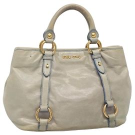 Borsa a mano Miu Miu in pelle azzurro chiaro oro Auth 138164