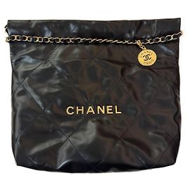 Borsa a mano Chanel 22 piccola in pelle nera