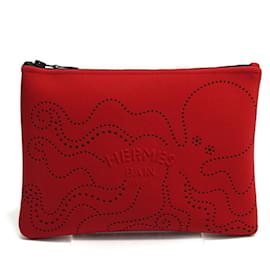 Pochette Hermès Neoban MM perforata con motivo a rilievo di polpo