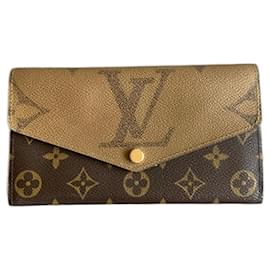 Louis Vuitton Sarah Geldbörse Monogramm Reverse Giant