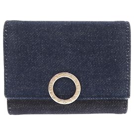 Bulgari Cartera Bvlgari de denim azul con tres pliegues