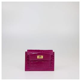 Porte-monnaie compact Kelly en alligator Rose Scheherazade d'Hermès