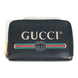 Monedero de cuero negro Gucci