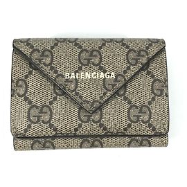 Portafoglio pieghevole Gucci in tela GG Supreme