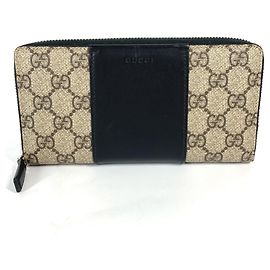 Portafoglio lungo con zip rotonda GG Supreme di Gucci