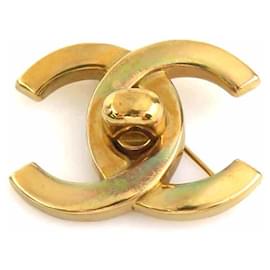 Spilla in metallo dorato Chanel Coco Mark