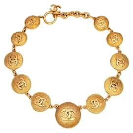 Collana con medaglione Chanel CC oro e metallo