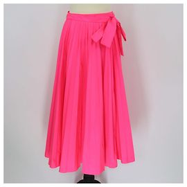 Gonna midi plissettata in poliestere rosa neon con vita legata Valentino