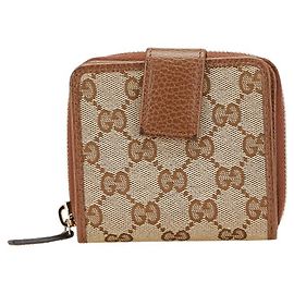 Portafoglio bifold con zip in tela GG Gucci