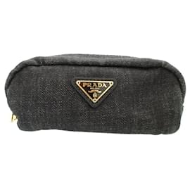 Pochette in denim nero con placca triangolare Prada