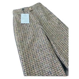 Pantalones Chanel de tweed beige