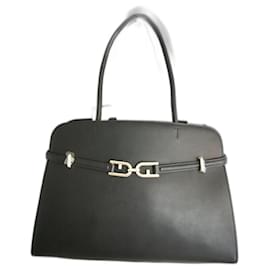 Borsa Furla in pelle liscia nera con finiture dorate