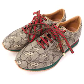 Sneakers stringate Gucci Palace GG Supreme con logo in metallo