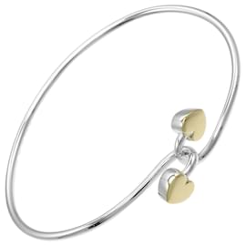 Bracciale a bangle con doppio cuore Tiffany & Co. in argento sterling con oro giallo 18K