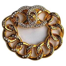Bracciale vintage Chanel autunno 1996 in tono oro con grandi anelli pavimentati di strass