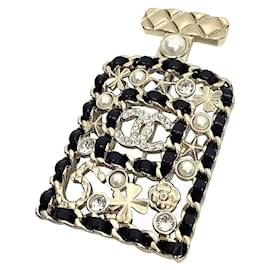 Spilla Chanel con motivo a bottiglia