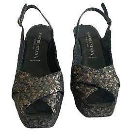 Autre Marque Mules compensées en cuir tressé main