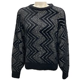 Maglione a collo rotondo Missoni nero / argento 2024 con paillettes a zig zag.