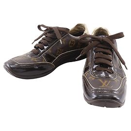 Sneakers basse in tela monogram e pelle verniciata Louis Vuitton