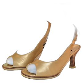 Sergio Rossi Offene Schuhe aus goldenem Leder Größe 35 IT