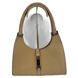 Borsa a spalla Gucci Jackie in pelle beige 283