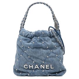 Sac à main Chanel Blue Mini en denim clouté 22