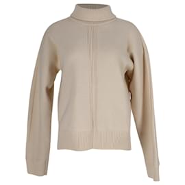 Cremefarbener Pullover aus Wolle mit Stehkragen und offenem Rücken von Jil Sander