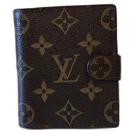 Louis Vuitton Notizbuchumschlag und Bleistift.