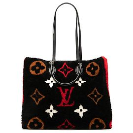 Louis Vuitton Borsa Onthego GM in shearling gigante monogramma nero