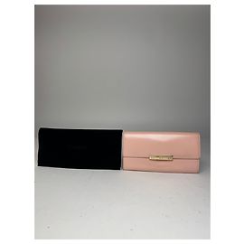Cartera de cuero patentado vintage Cartier rosa
