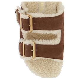 Infradito Prada in suede marrone e nuovo shearling