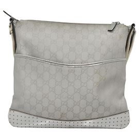 Borsa messenger Gucci in tela GG con pelle perforata media