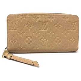 Cartera Zippy Louis Vuitton en Monogram Empreinte Beige Duna