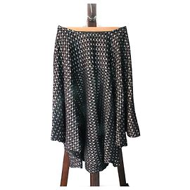 Alaïa jupe mi-longue noire à effet métallisé neuve avec étiquette taille 34 européenne