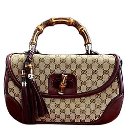 Bolsa Gucci de couro e tecido marrom com alça de bambu