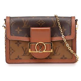 Portafoglio Louis Vuitton Dauphine Wallet on Chain in Monogramma Inverso Marrone